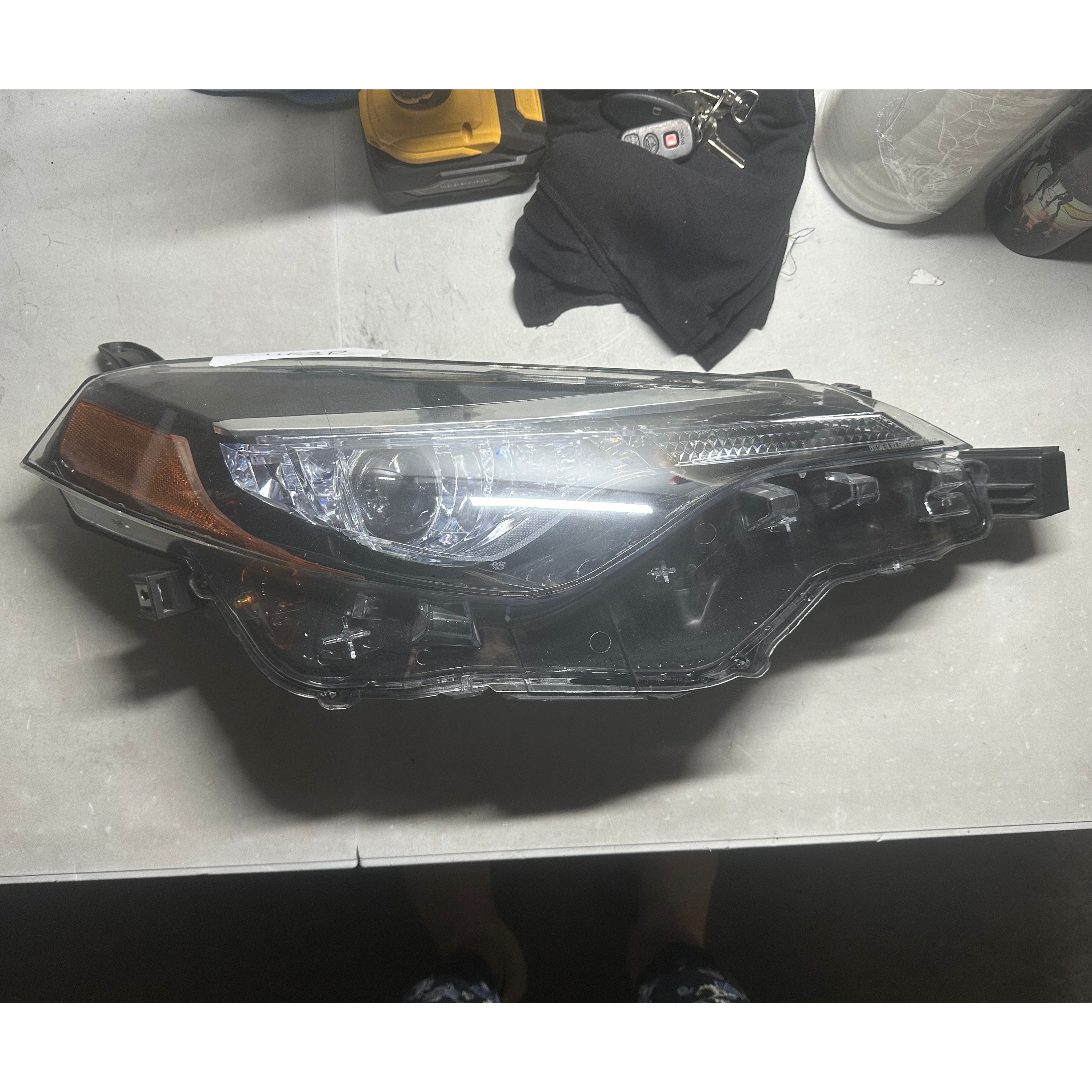 <p>2017 2018 2019 Toyota Corolla L LE Headlight Assembly Halogen with LED Daytime Running Lights DRL Passenger Side Damaged</p>